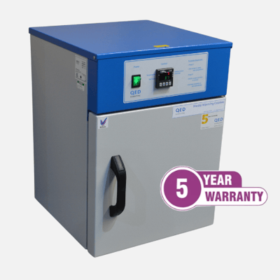 Contrast media warmer with door shut and '5 YEAR WARRANTY' symbol.