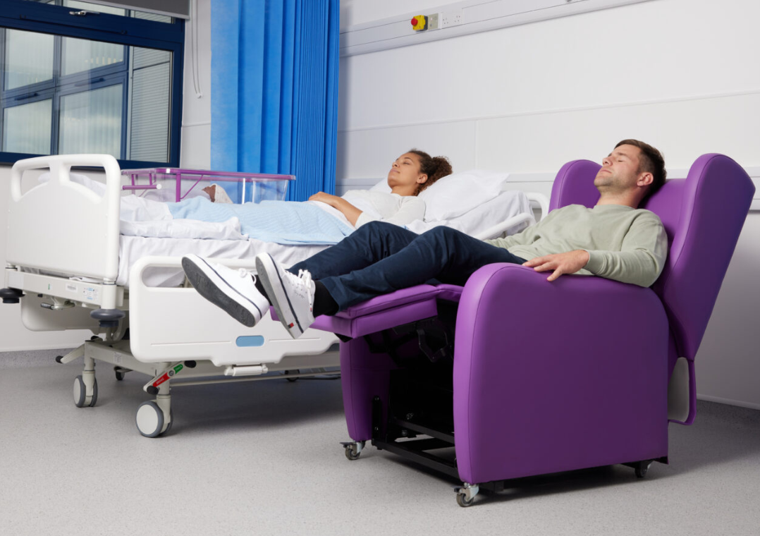 Partner relaxing in electric recliner