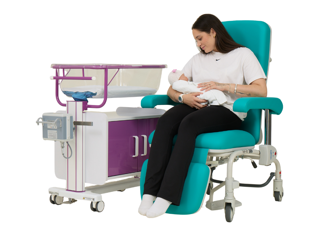 Mum & Baby in Kangaroo Chair Next to Medwarm Hot Cot