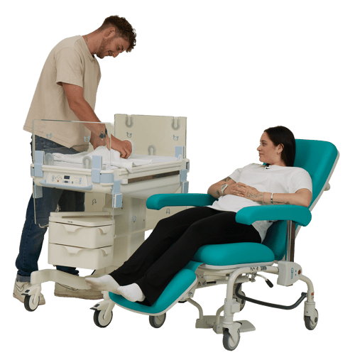 Dad Changing Baby in Lifetherm Next to Mum on Kangaroo Chair (500 x 500)