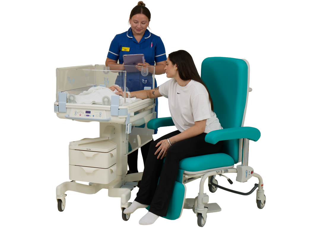 Mum in Kangaroo Chair and Midwife Stood Next to Baby in Lifetherm 2000
