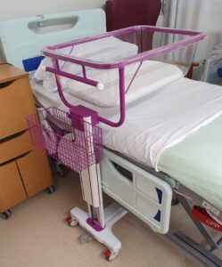 Purple cot with hospital bed