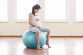 Pregnant woman on birthing ball